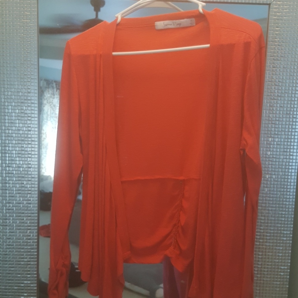 Salmon colored thin cardigan